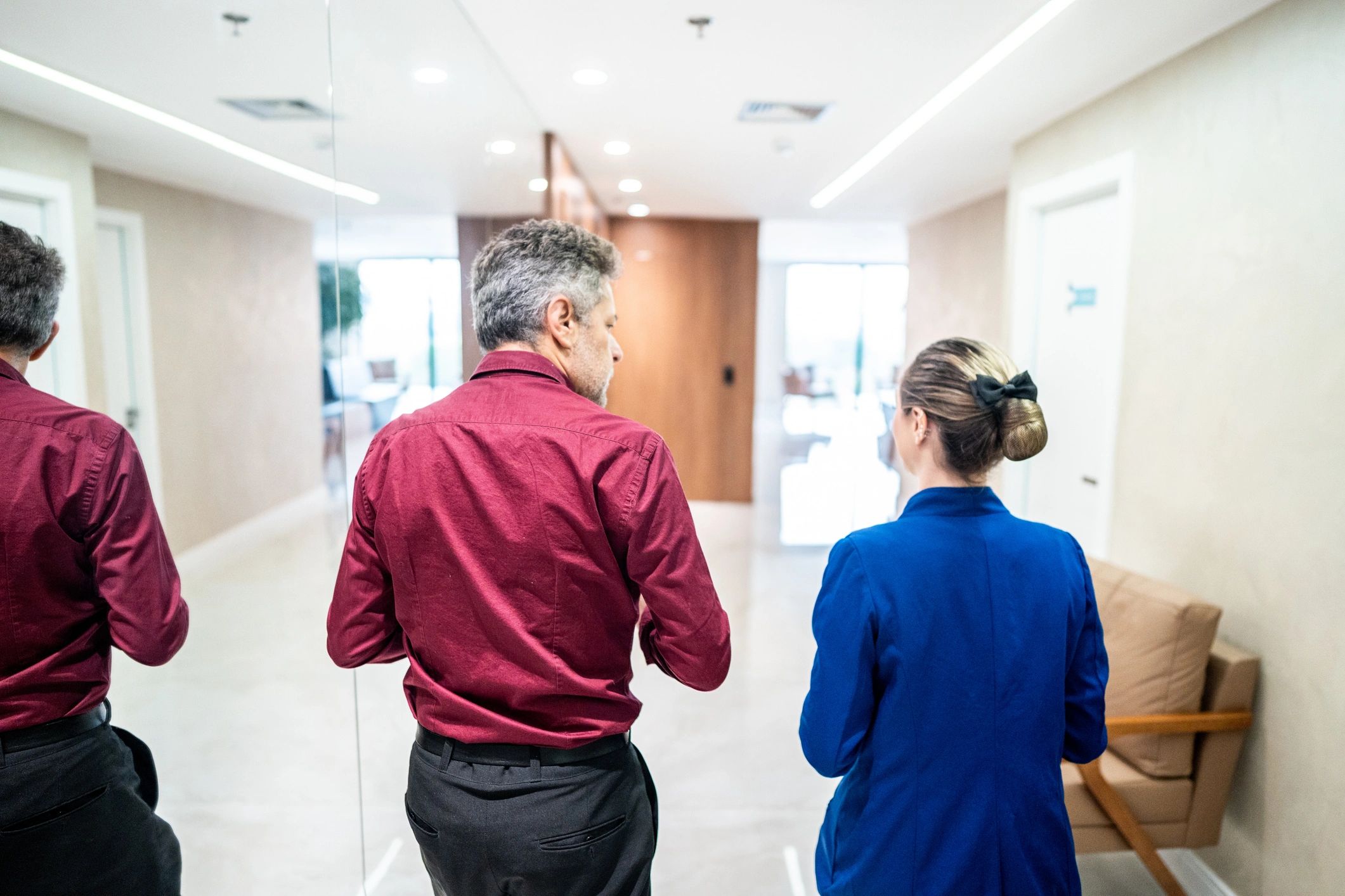 Professional consultation between staff and client in a modern office