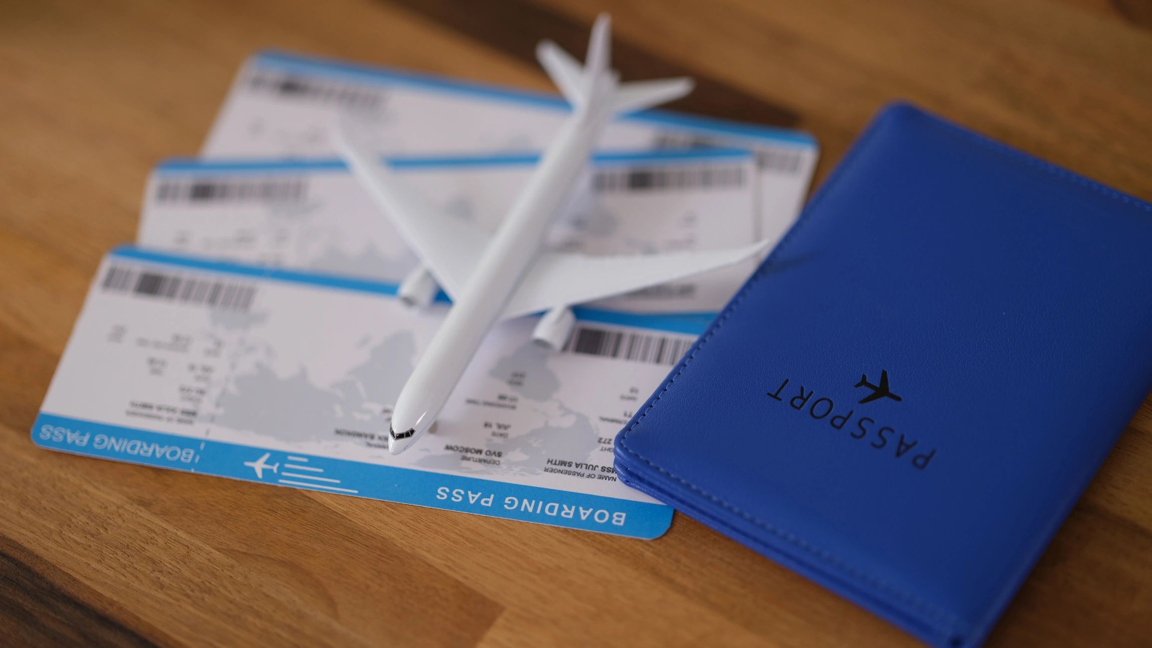 Passport and travel documents representing immigration assistance