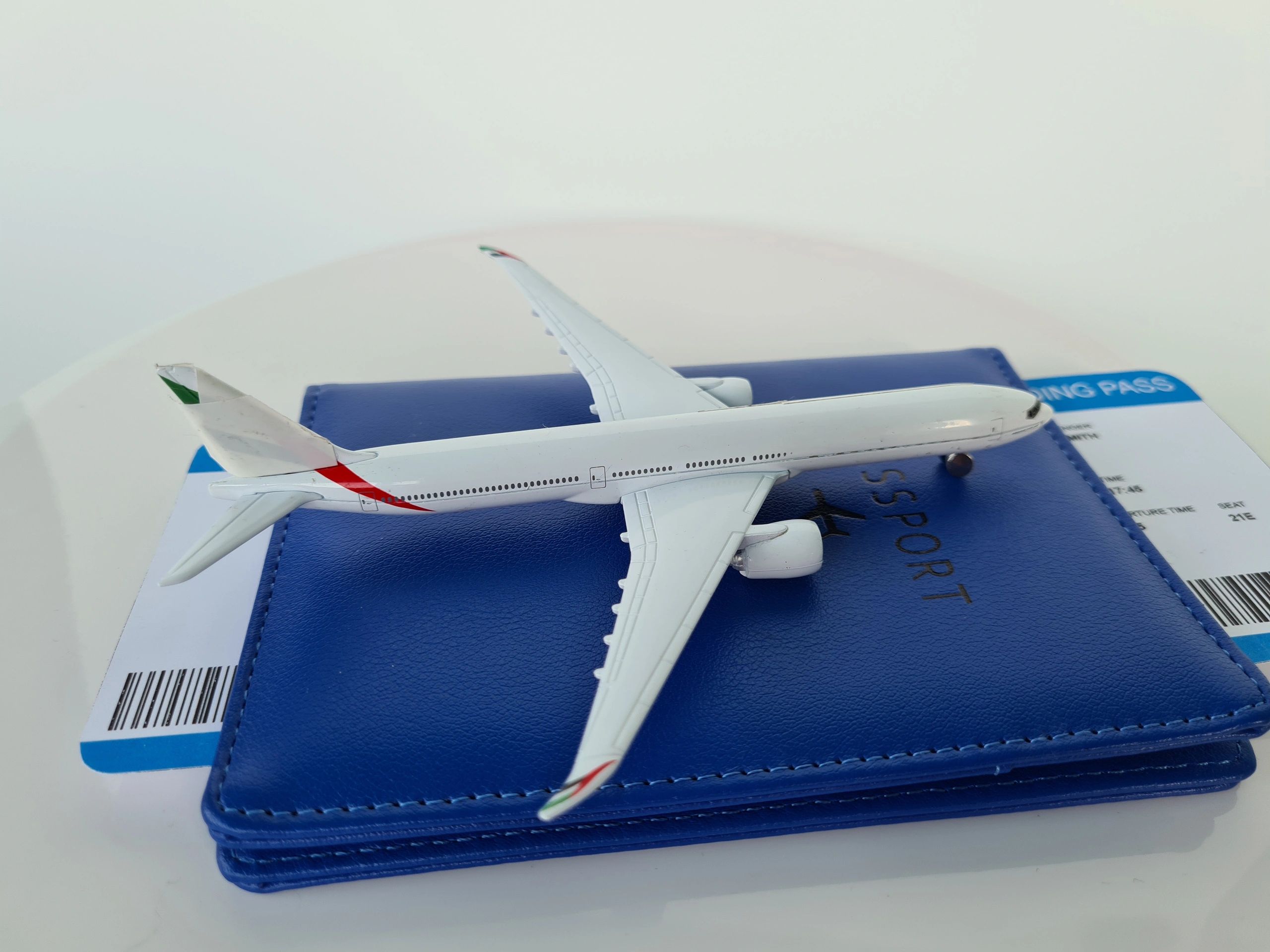 Passport with airplane tickets representing overseas opportunities