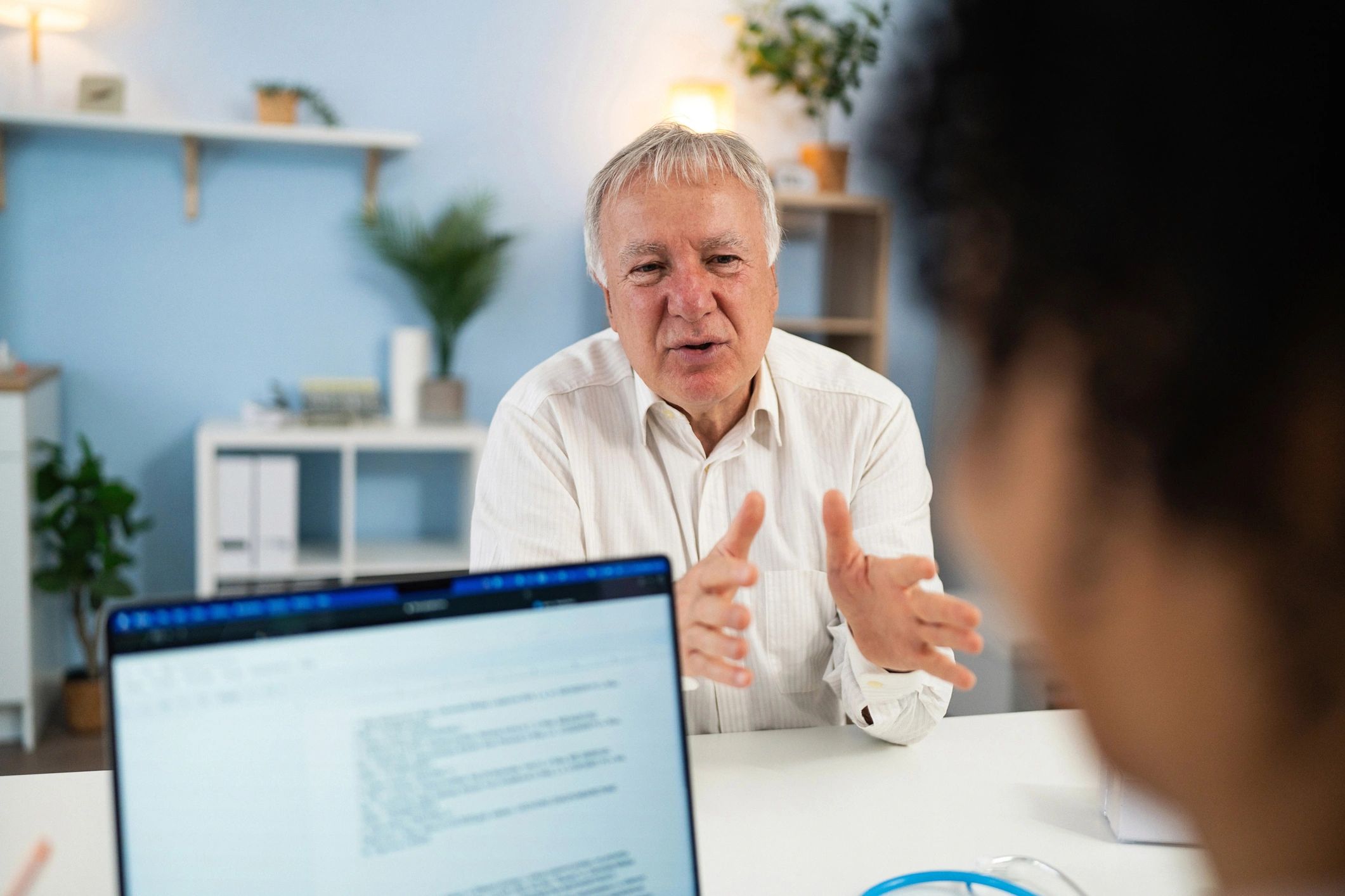 Advisor speaking with a client during a detailed consultation