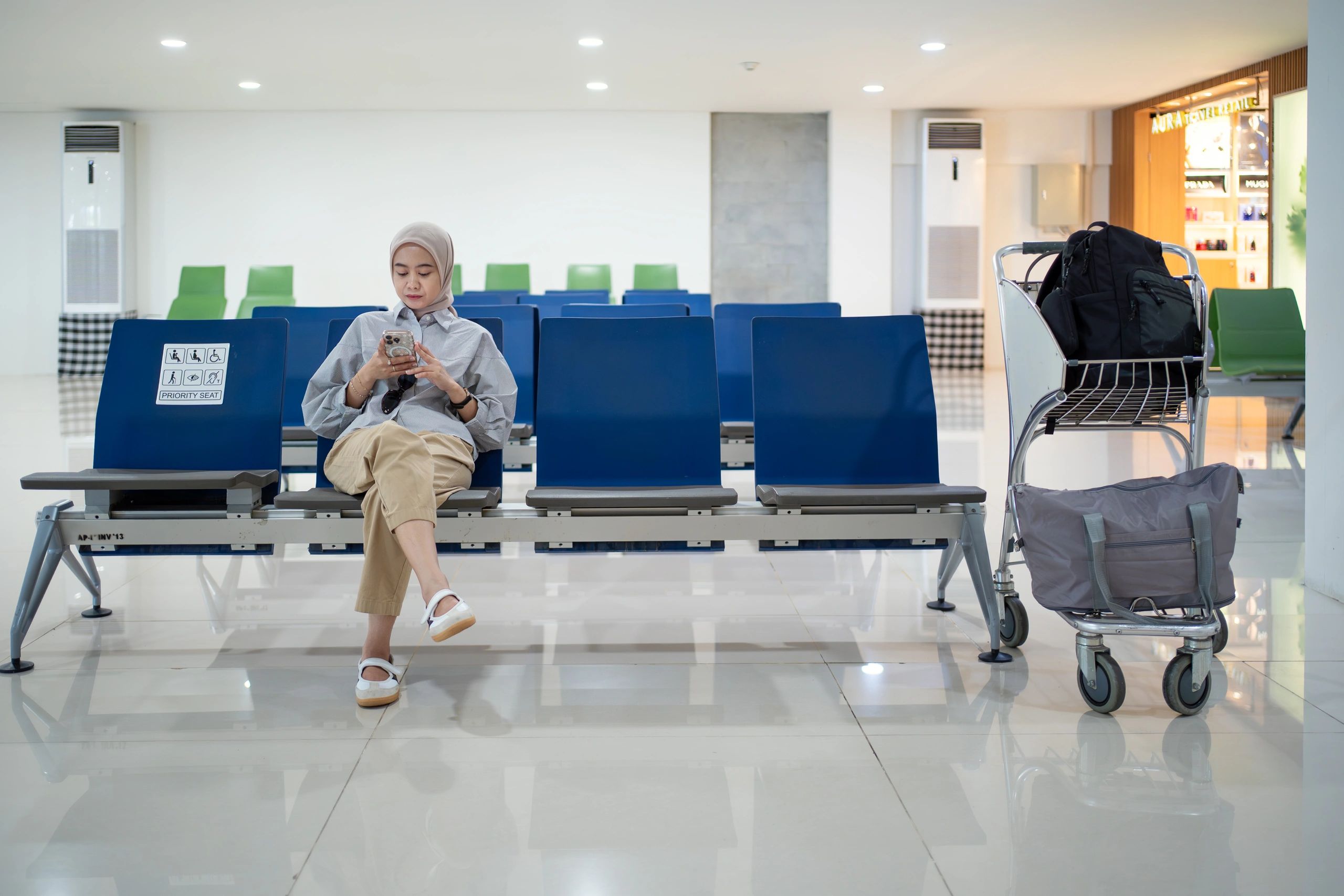 Traveler at airport terminal representing work permit assistance