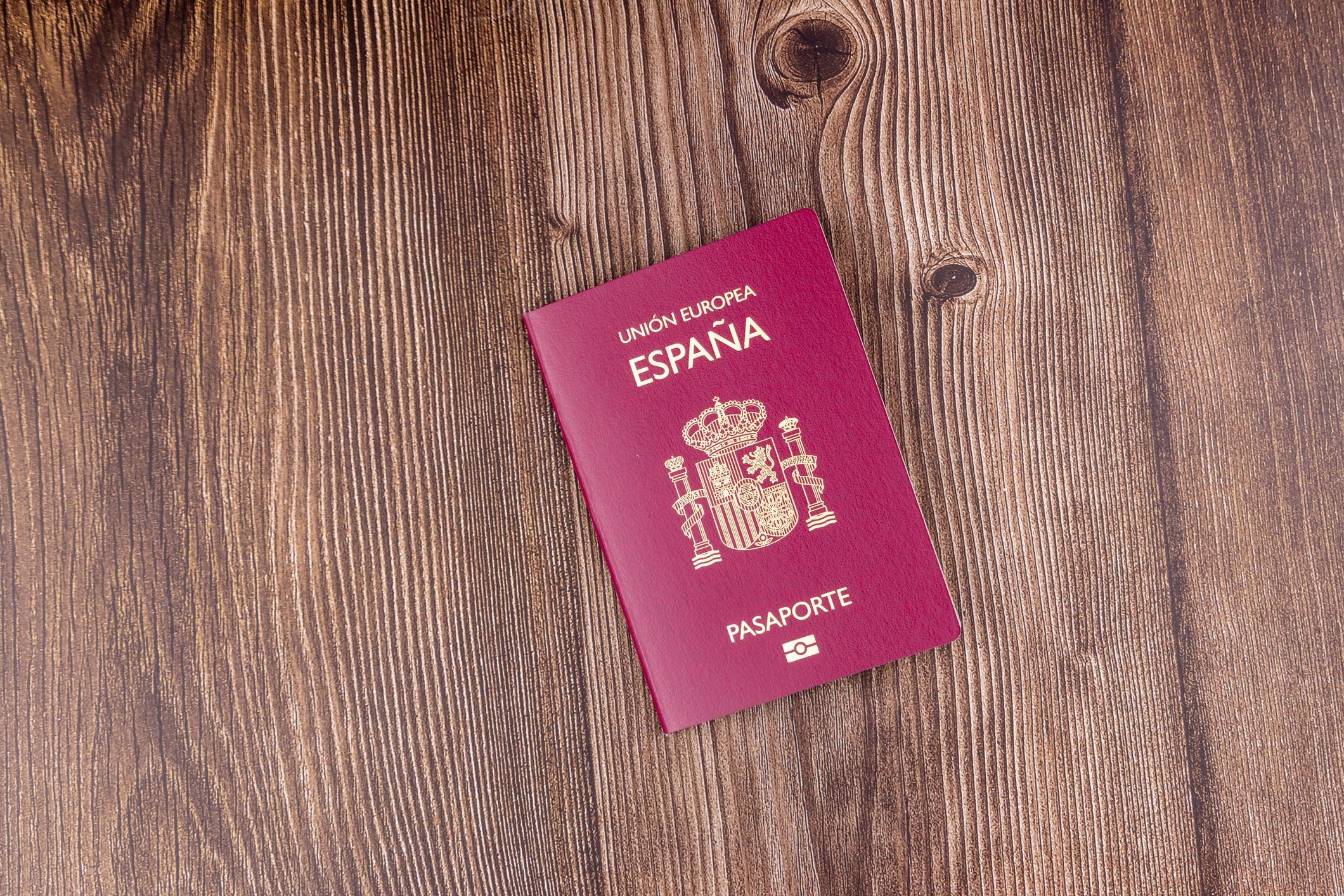 Passport and premium boarding passes symbolizing international travel planning